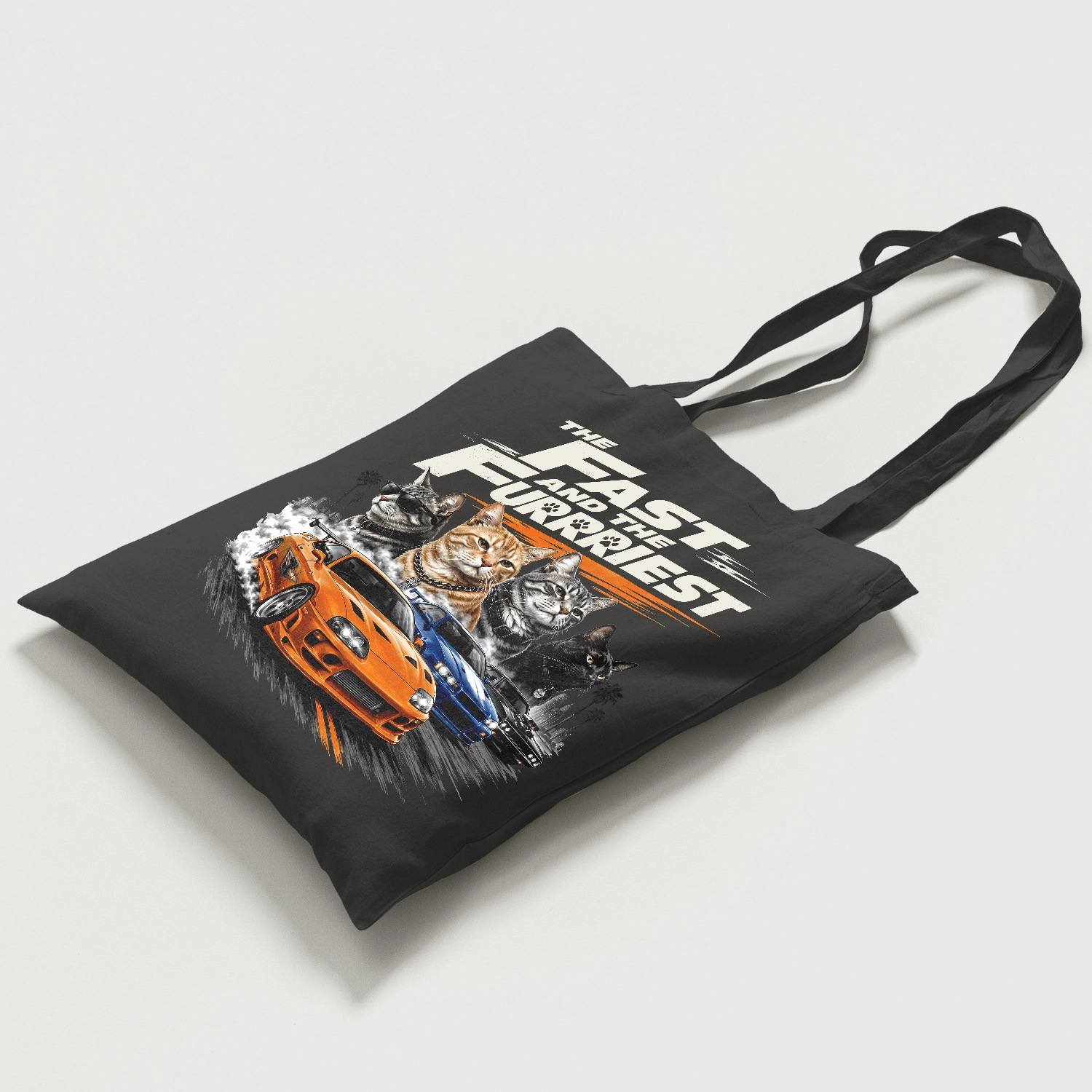 Humorous feline artwork shown on tote bag