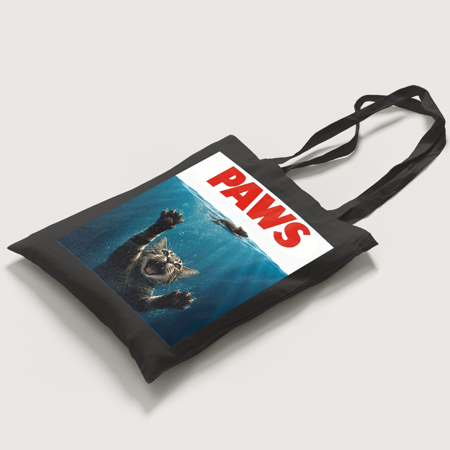 Funny feline artwork displayed on a tote bag
